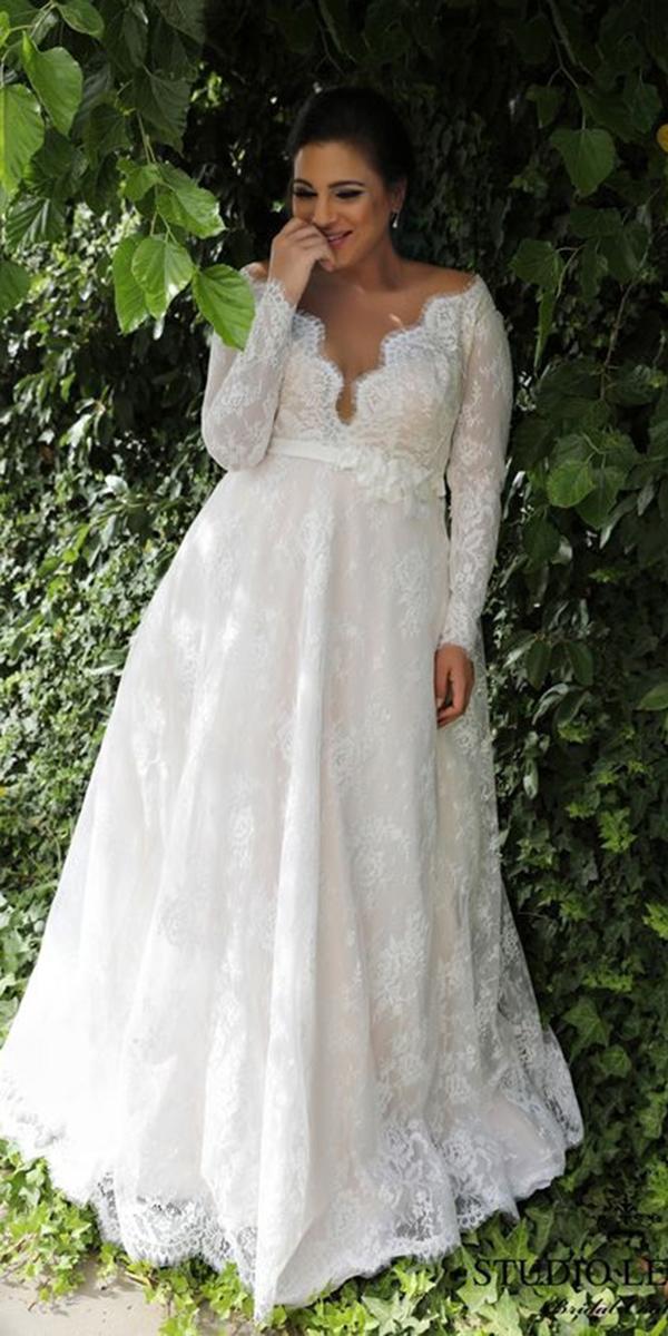 https://weddingdressesguide.com/wp-content/uploads/2012/05/plus-size-wedding-dresses-a-line-with-long-sleeves-v-neckline-lace-studio-levana.jpg