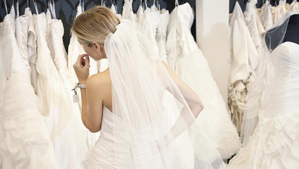 how to choose a wedding dress back view bride looking for gowns bethaney photography