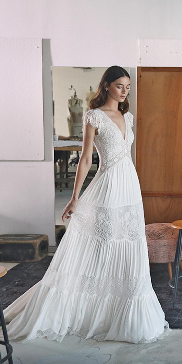 lace v neck with short sleeves and train lihi hod wedding dresses