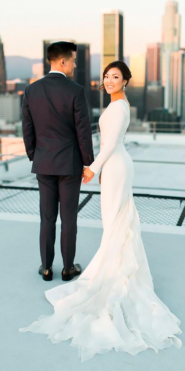 simple mermaid long sleeved modest wedding dresses with train ruth eileen