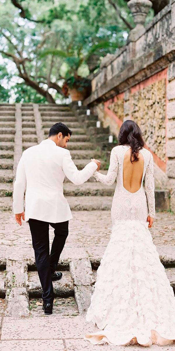 mermaid lace low open back destination wedding dresses with long sleeves naaem khan