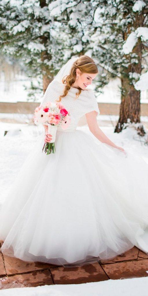 what to wear to a winter wedding ball gown layered skirt with knitted cape sheamcgrath