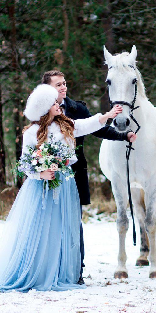 what to wear to a winter wedding blue ball gown color with fur hat anastasia marchenko