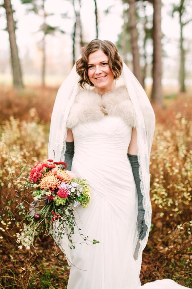 what to wear to a winter wedding vintage dress with gloves fur camilla jorvad