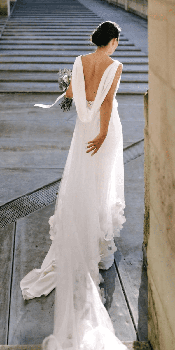 backless wedding dresses bride on the stairs