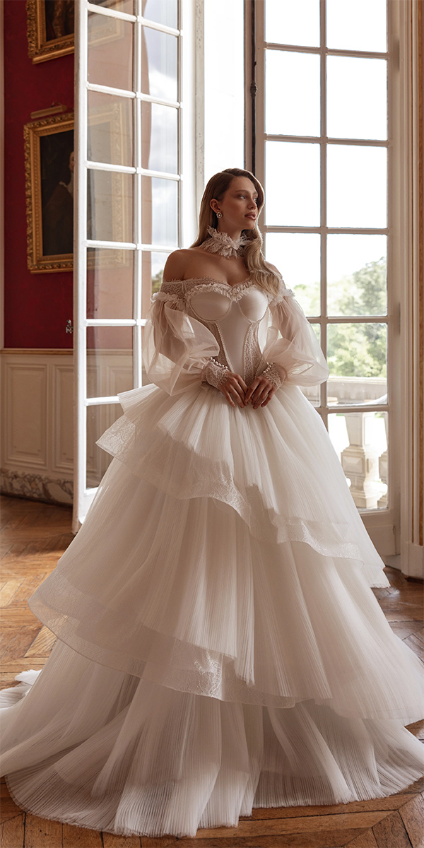twedding dress trends 2026 ball gown with long sleeves ruffled skirt inavalerdi